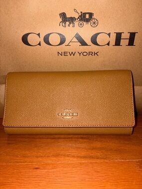 COACH Leather Continental Wallet in Saddle Tan (Tri-Fold)